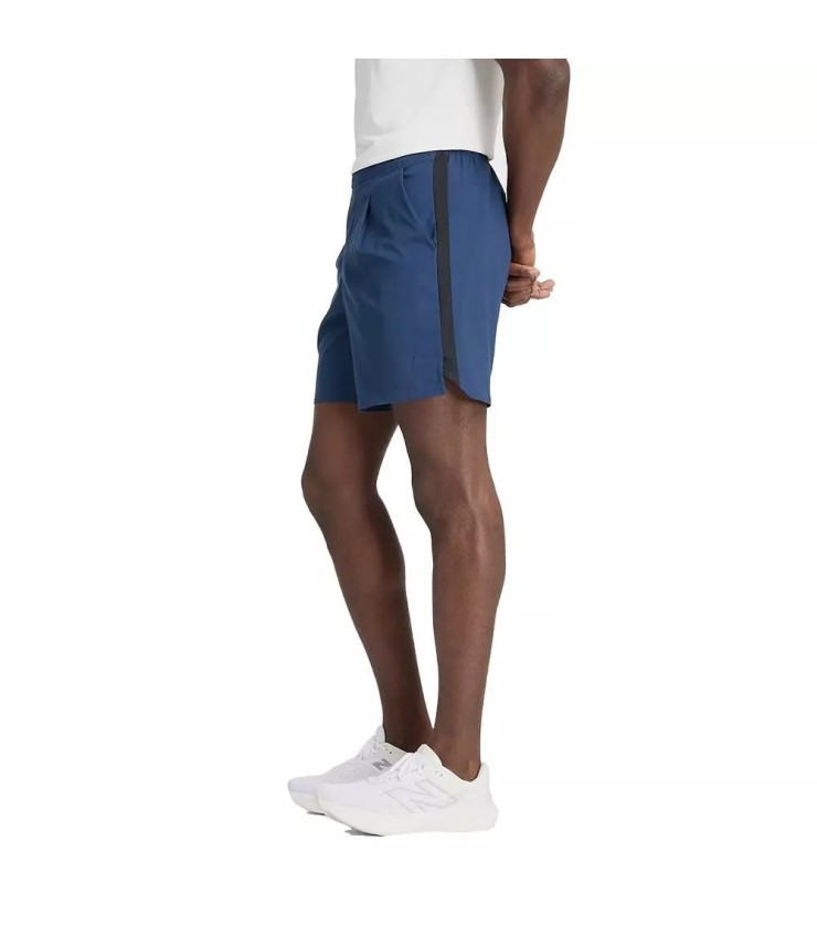 Calções de torneio azul marinho da New Balance. | IPONTENNIS