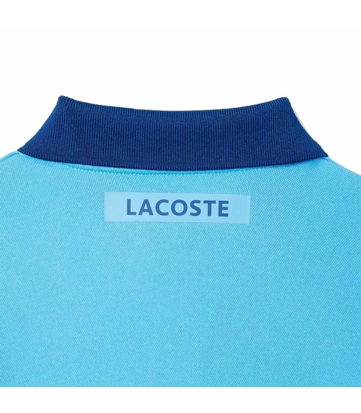 Polo blu da tennis per giovani Novak Djokovic di Lacoste | Ipontennis